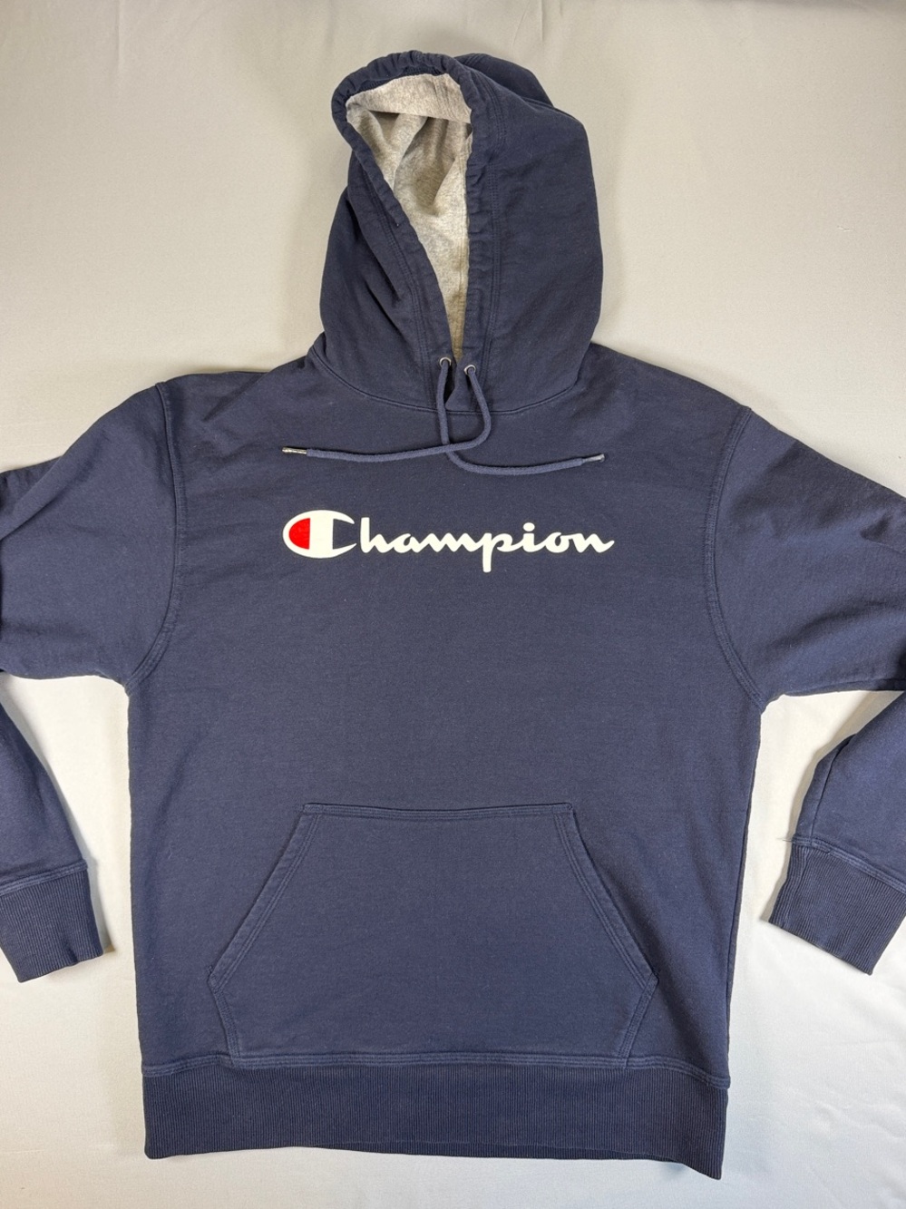 Champion Navy Hoodie with White Script and Red Logo Accent